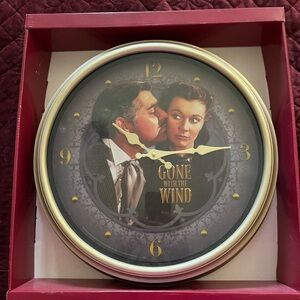 Vintage Film-Themed Wall Clock with Gold and Cream Accents